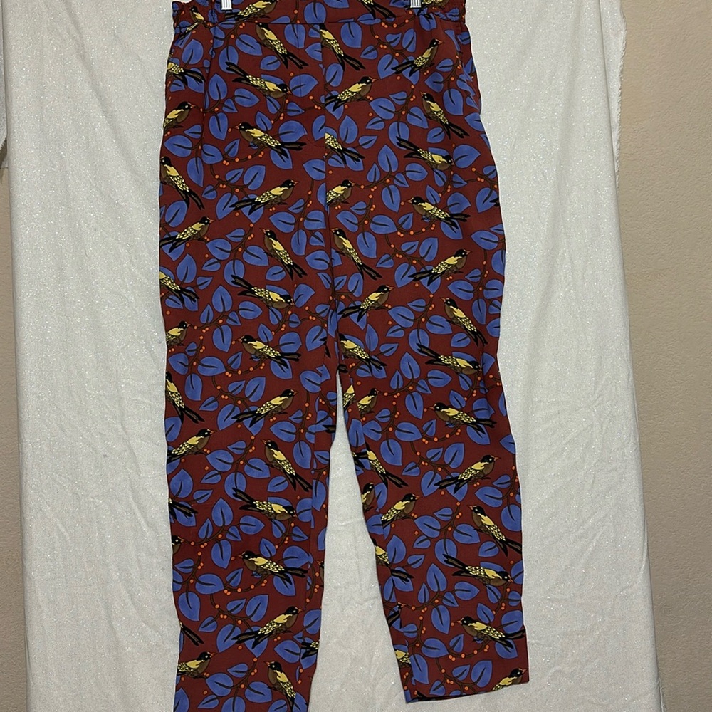 Anthropologie pull on trousers brown with yellow bird print. Size large tall.